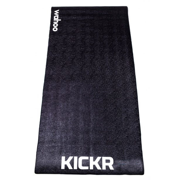 A Wahoo training mat that prevents a turbo trainer damaging your floor while cycling inside