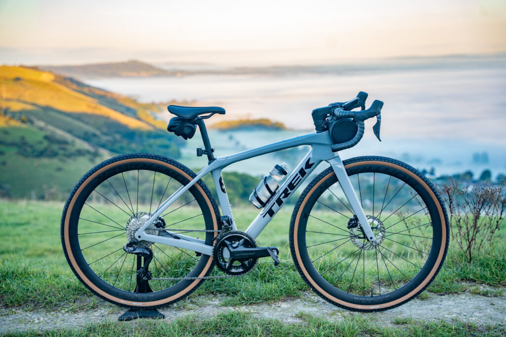 A Trek Domane SL 7 with 38mm gravel bike tyres on top of devils dyke looking out over a cloud inversion