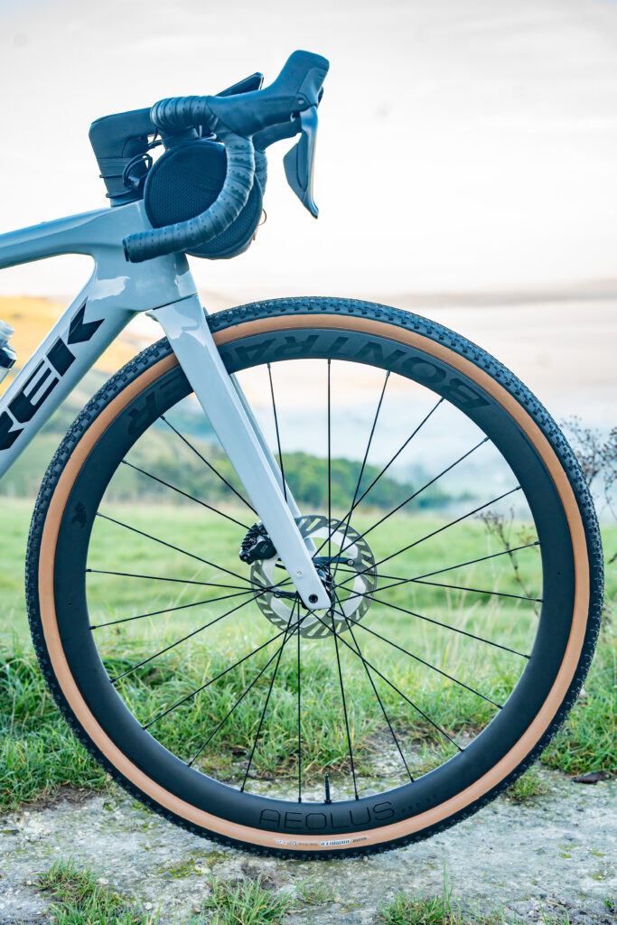 A close up of Maxxis Rambler 38mm gravel tyres on a Trek Domane SL 7